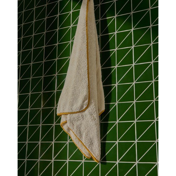 Žuti /bijeli pamučan ručnik od frotira 70x140 cm Sedora – Kave Home-image-1