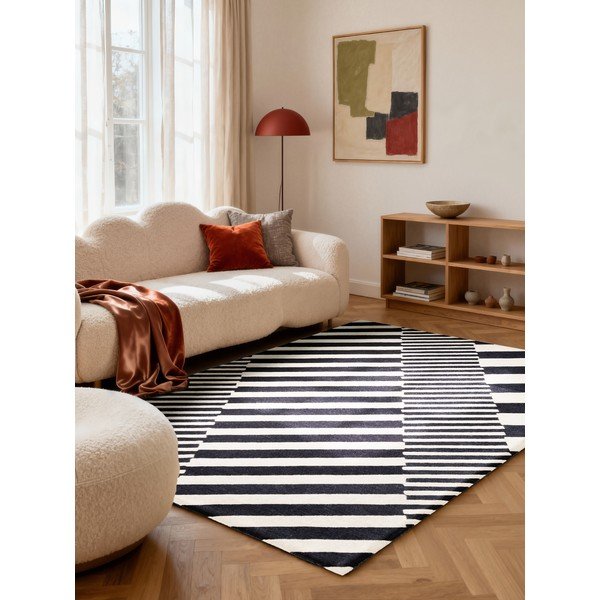 Crno-bijeli ručno rađen vunen tepih 160x230 cm Stryve Flux – Elle Decoration-image-1
