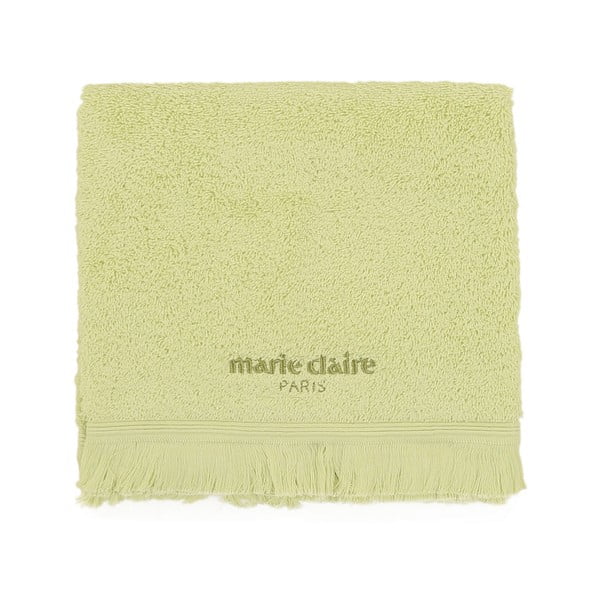 Zeleni ručnik na ruci Marie Claire