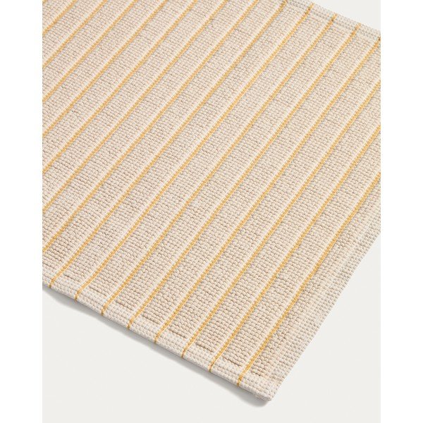 Žuta /bež tekstilna kupaonska prostirka 50x80 cm Merade – Kave Home-image-1