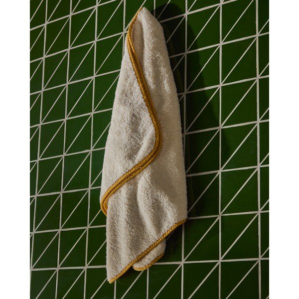 Žuti /bijeli pamučan ručnik od frotira 50x90 cm Sedora – Kave Home-image-1
