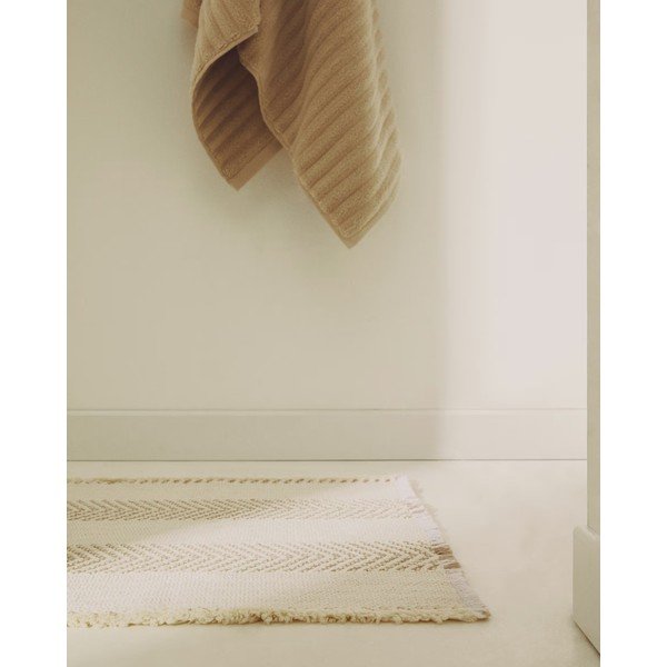 Bež kupaonska prostirka 50x70 cm Bina – Kave Home-image-1