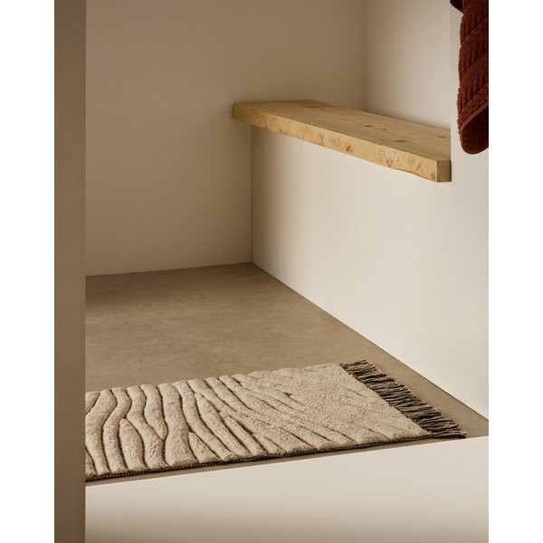 Bež kupaonska prostirka 50x70 cm Crilda – Kave Home-image-1